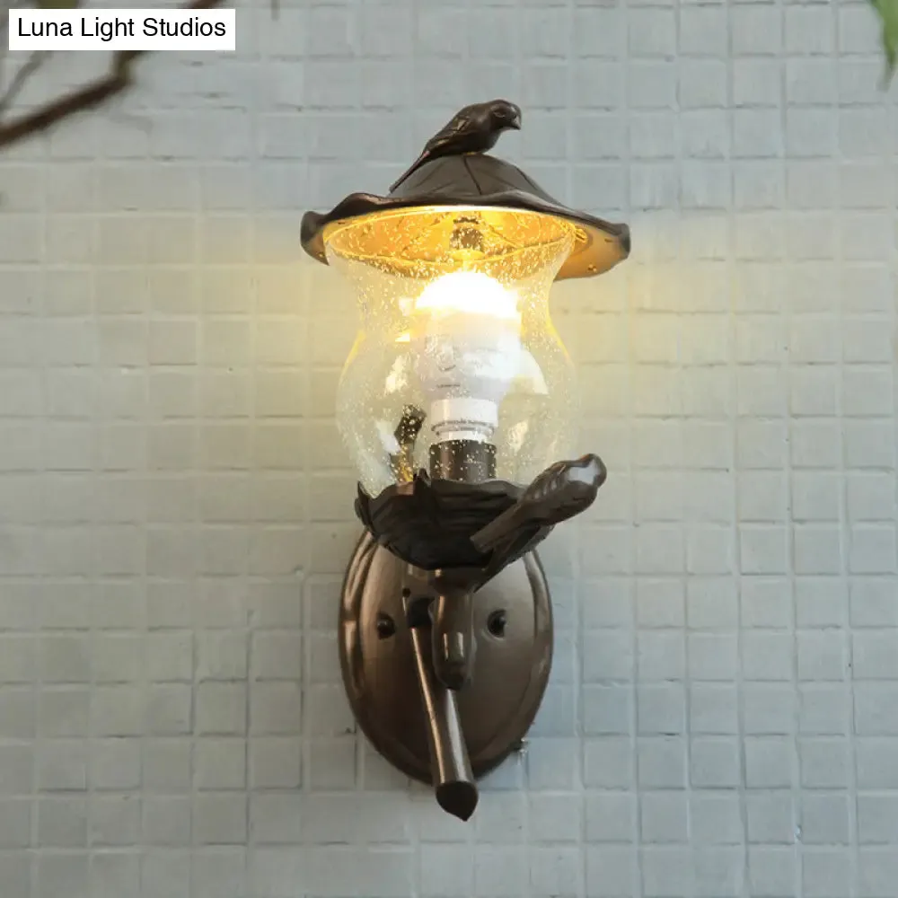 Rustic Black Gourd Shaped Garden Wall Lamp - 1-Light Seedy Glass Lantern Sconce with Charming Bird Deco